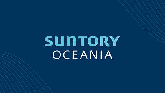 The Suntory Oceania logo on a navy background, with the brand wind pattern in the top right and bottom left corners